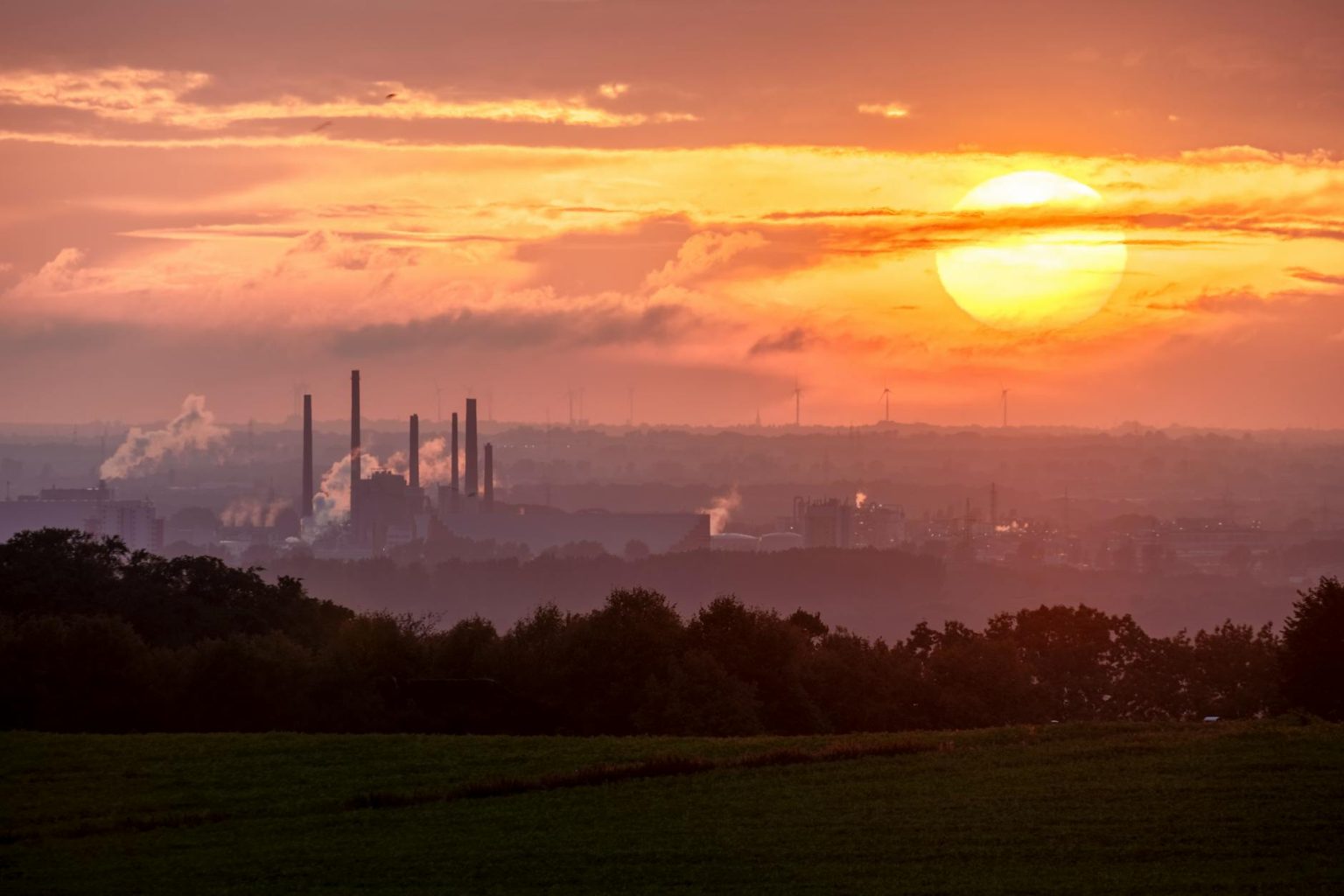 clouds and factory smoke at sunset